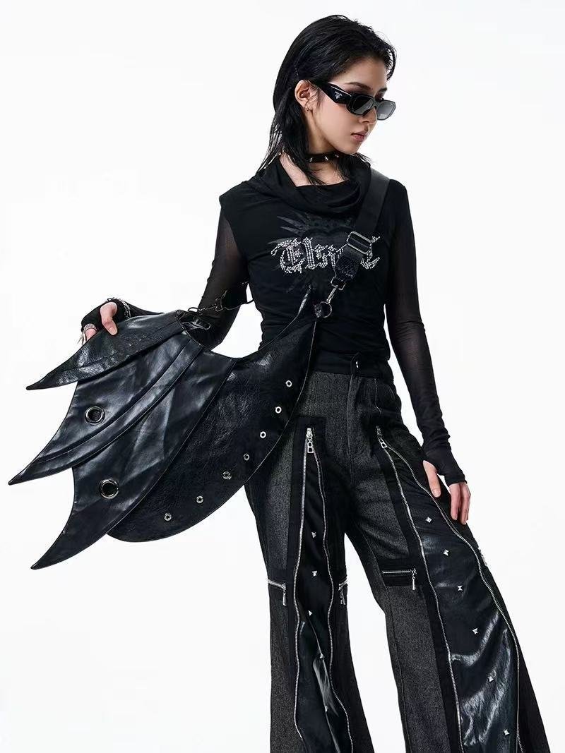 Darkvibe Punk Armor Bag with metallic accents, worn as a crossbody bag 5