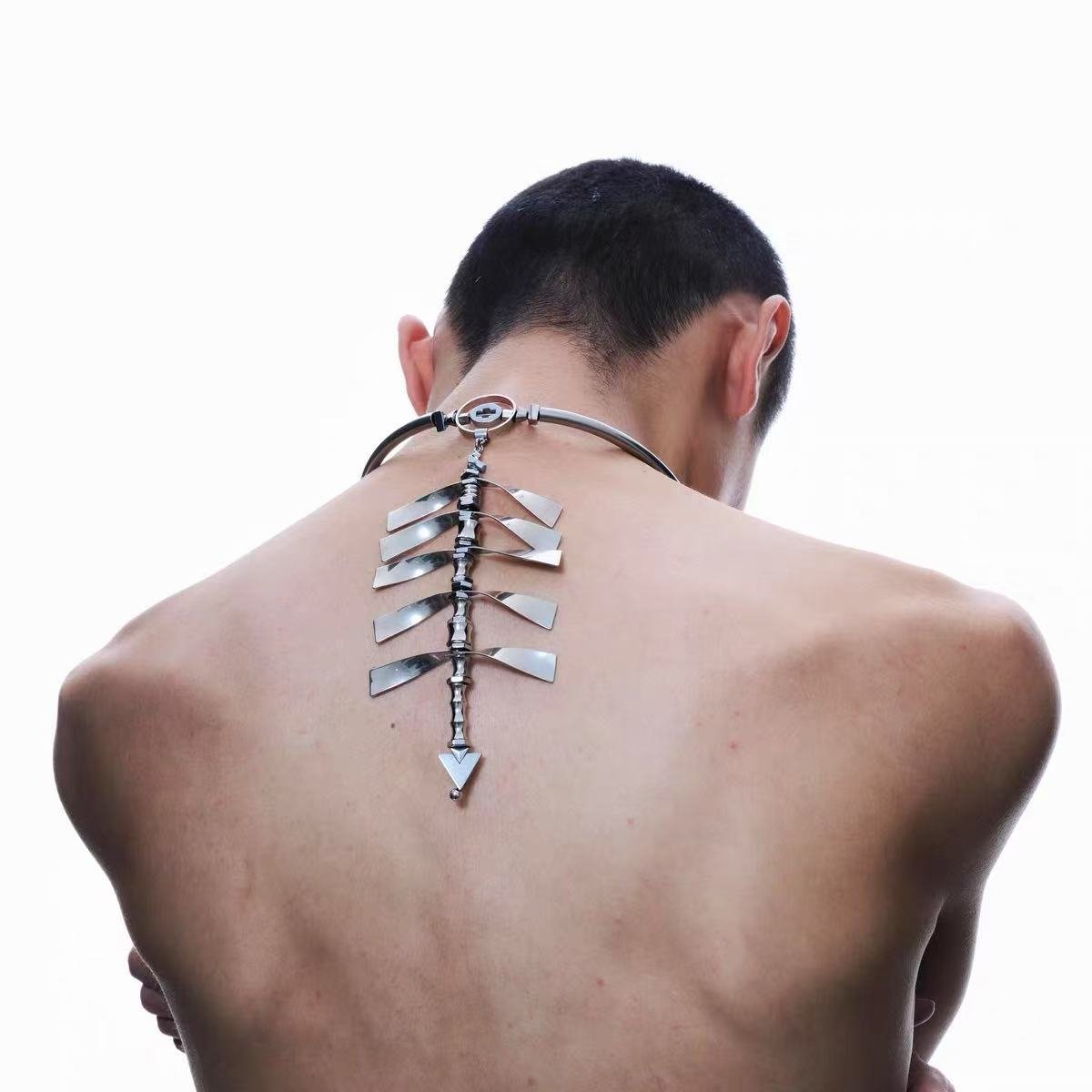 Void spine punk titanium steel necklace on dark background 3