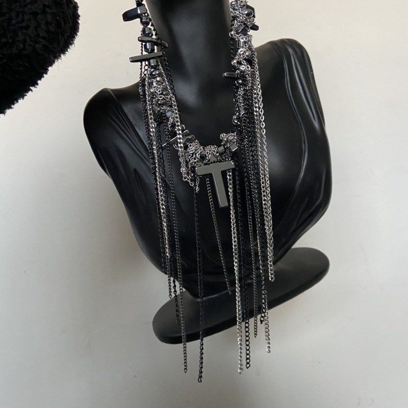 Dark punk choker with cross tassel and irregular beads on display 3