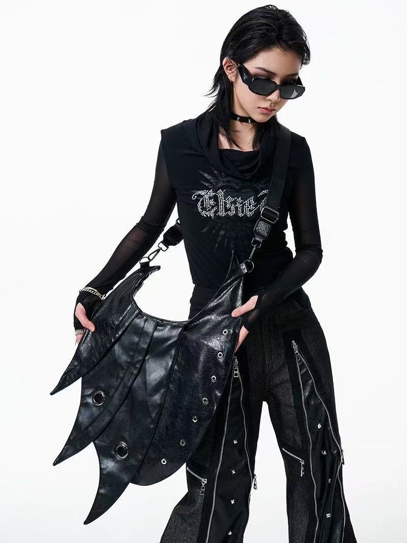 Darkvibe Punk Armor Bag with metallic accents, worn as a crossbody bag 3