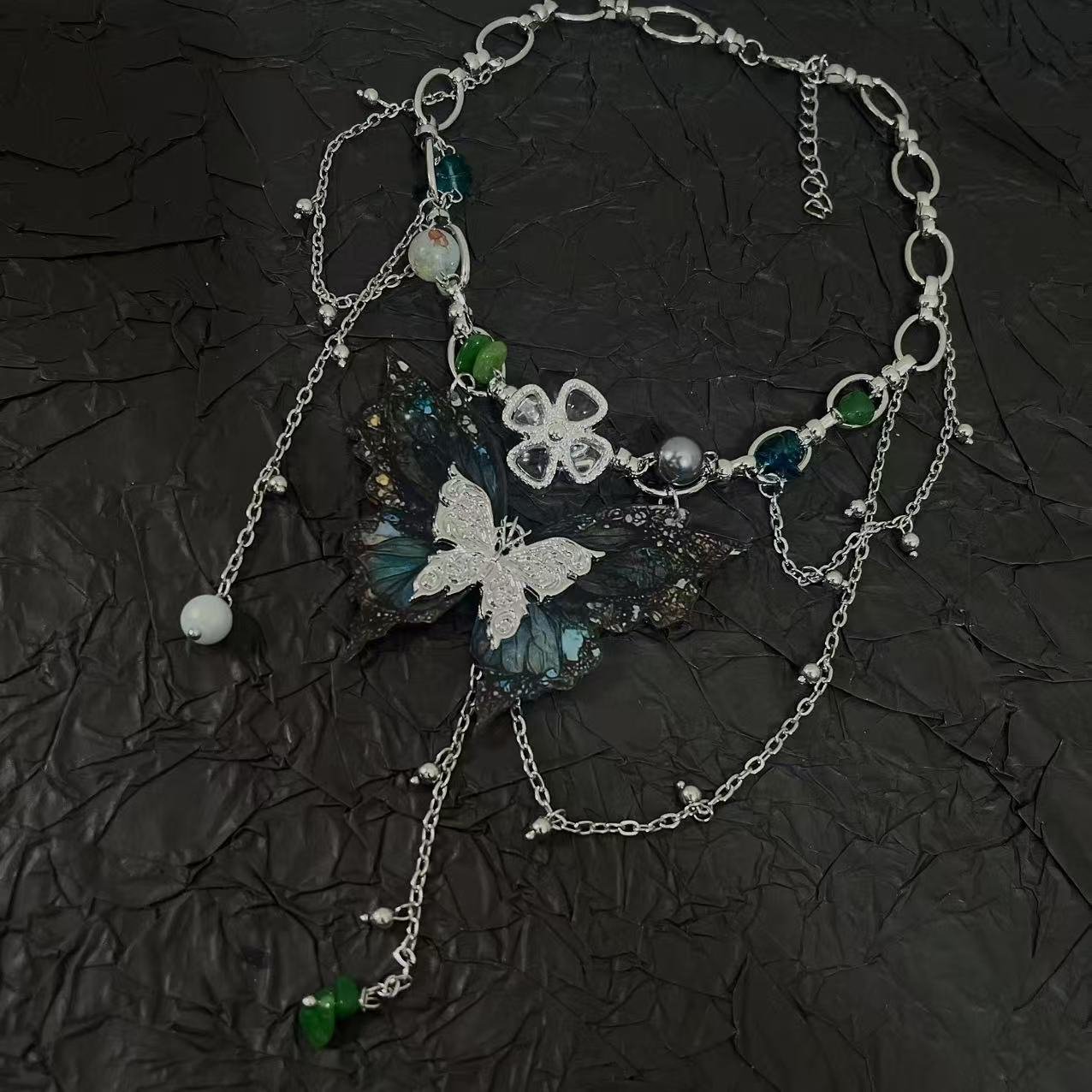 Y2K retro irregular beaded tassel butterfly choker on a model 4
