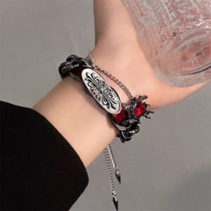 Y2K love heart wrap chain accessory with metal studs on wrist, punk style