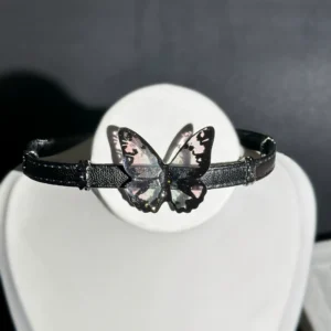 Butterfly tassel leather choker on model, showcasing cool summer style