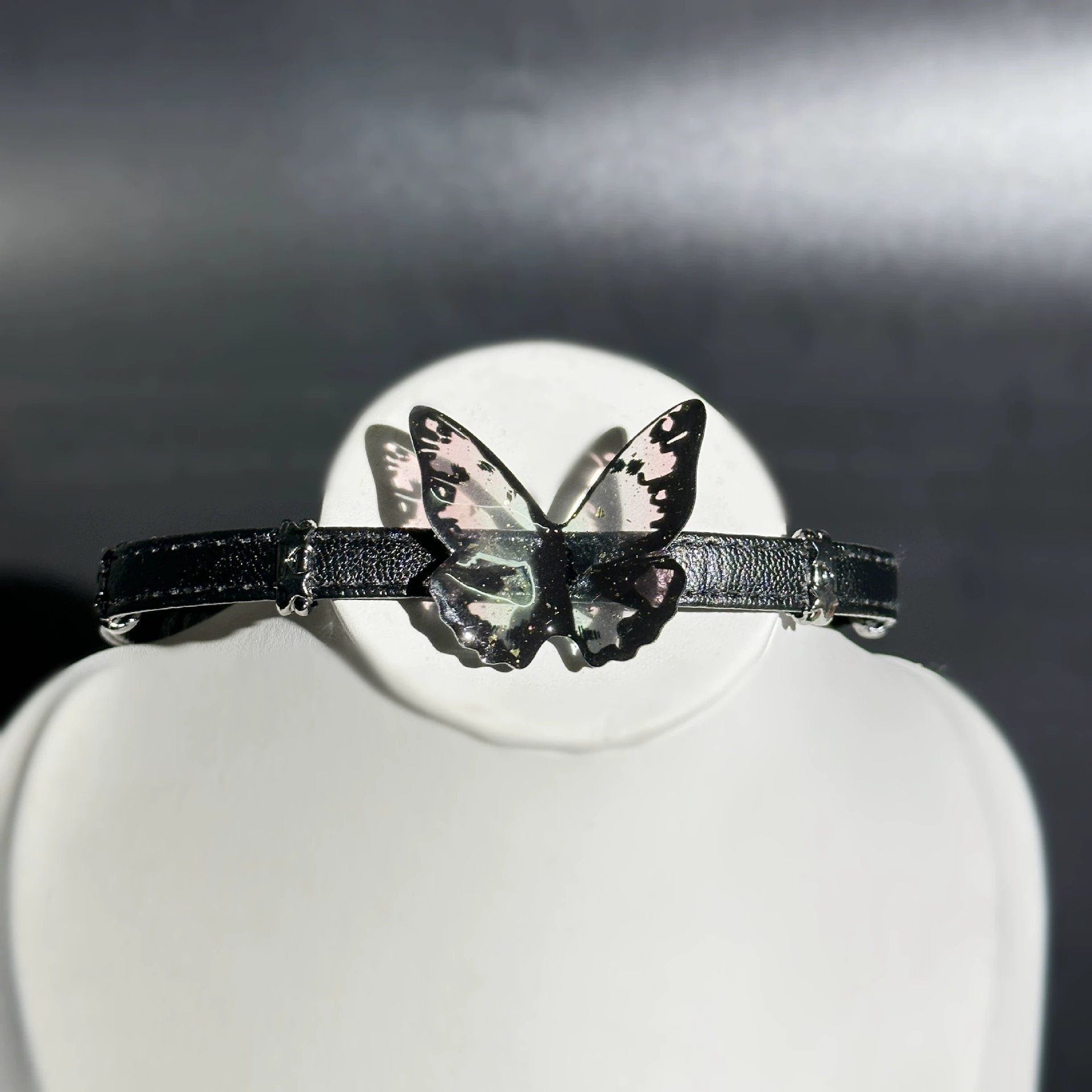 Butterfly tassel leather choker on model, showcasing cool summer style 2