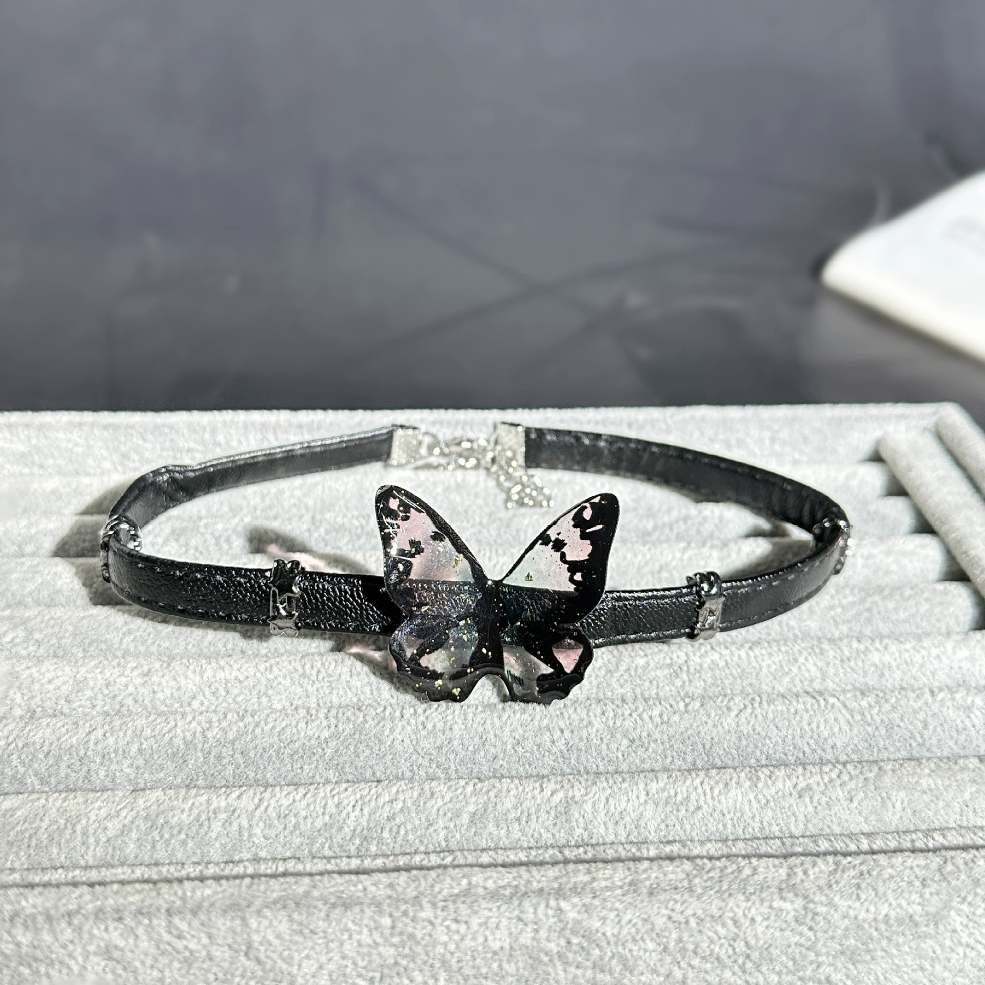 Butterfly tassel leather choker on model, showcasing cool summer style 3